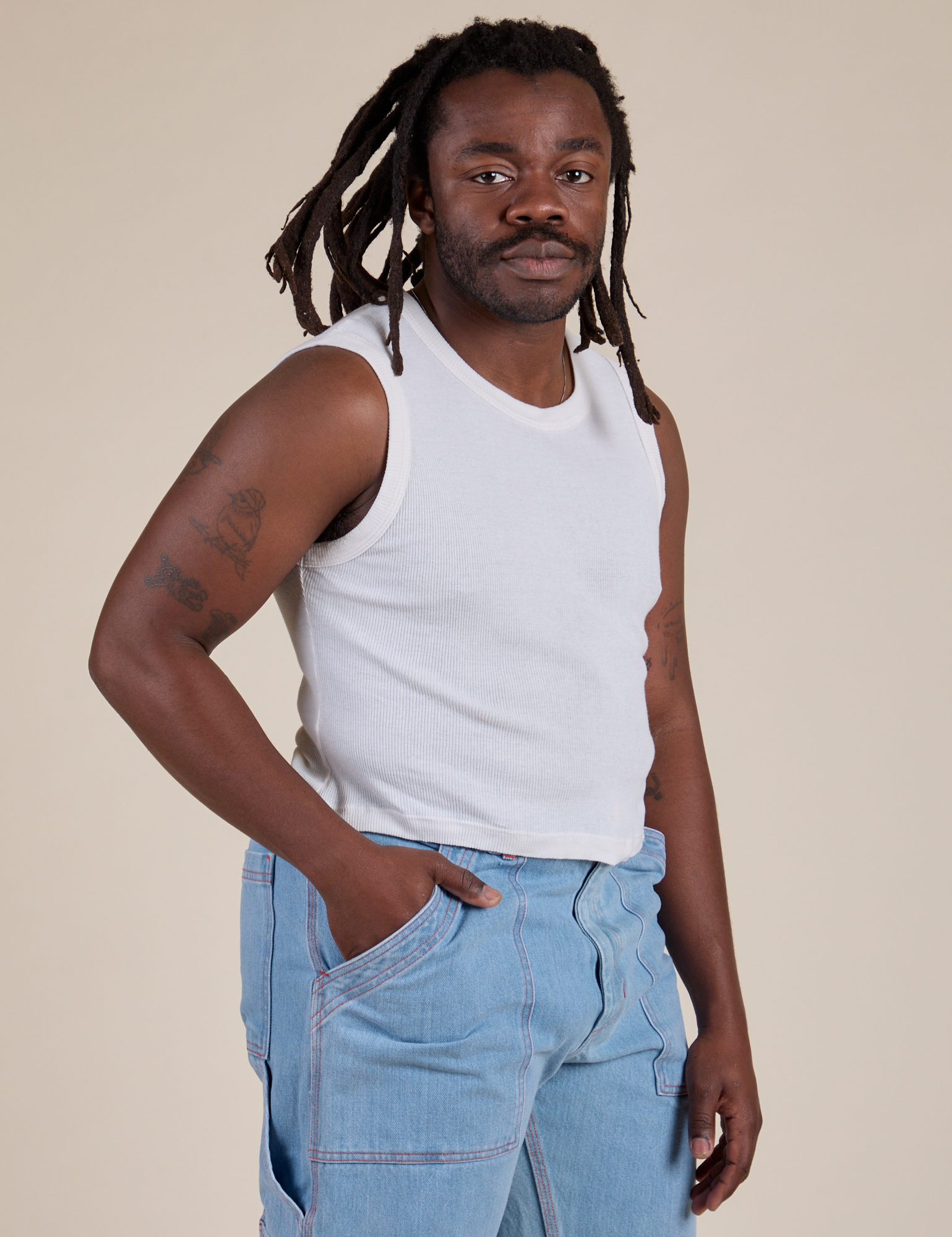 Angled front view of Muscle Tee in Vintage Tee White on Demi