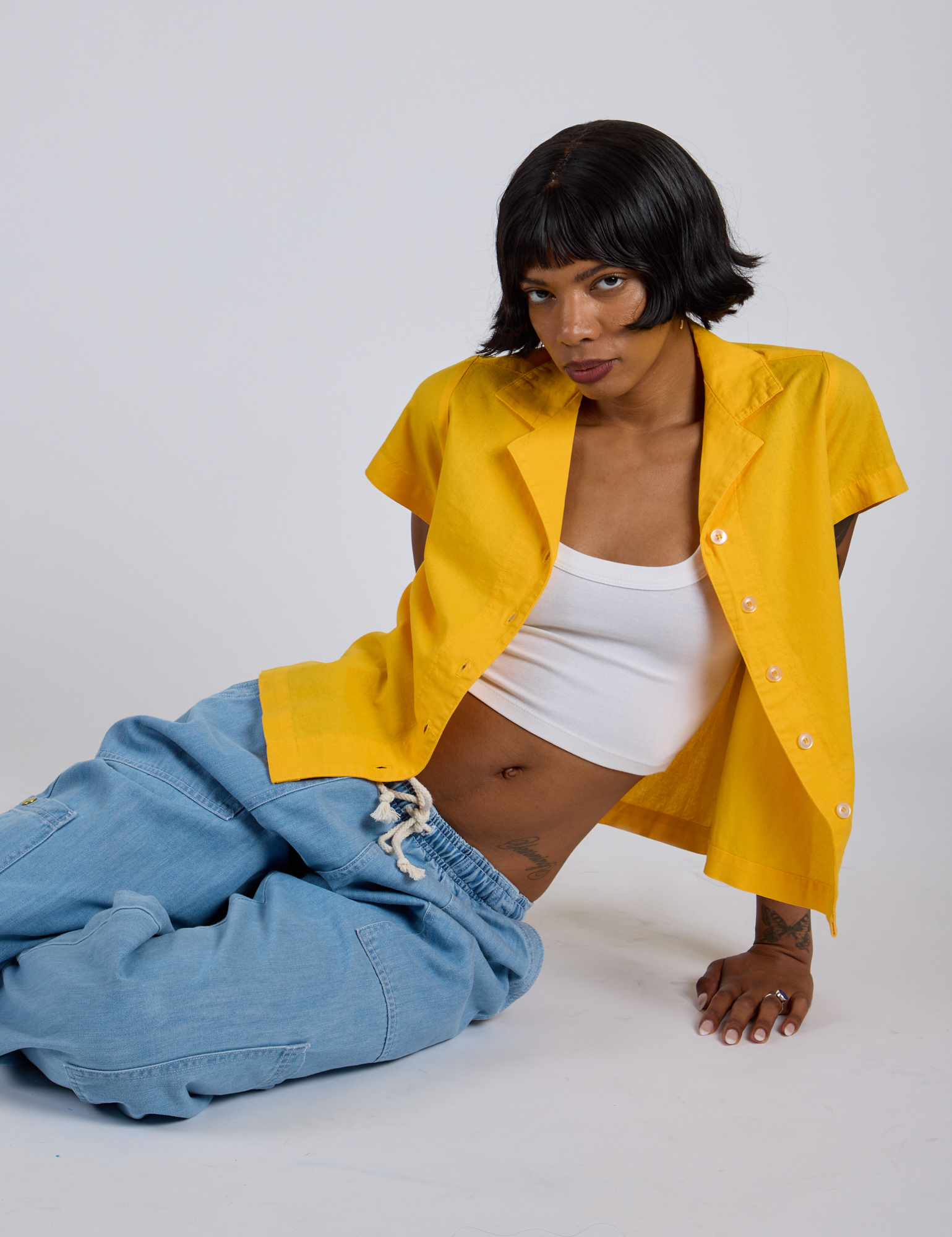Pantry Button-Up in Sunshine Yellow and light wash Denim Drop Pocket Pants worn by Kira