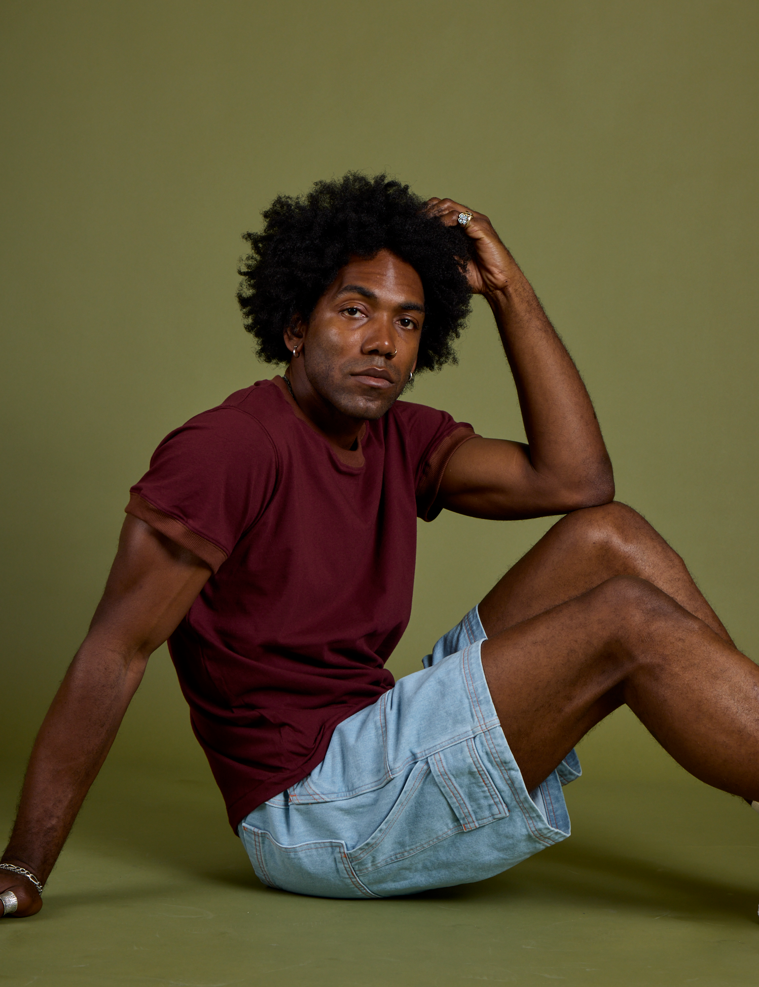Vintage Ringer Tee in Red Wine and Carpenter Shorts in light wash on Jerrod