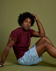 Vintage Ringer Tee in Red Wine and Carpenter Shorts in light wash on Jerrod