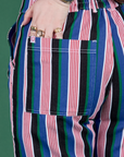 Close up of Sydney's hand in the back pocket of  Work Pants in Pacific Stripe