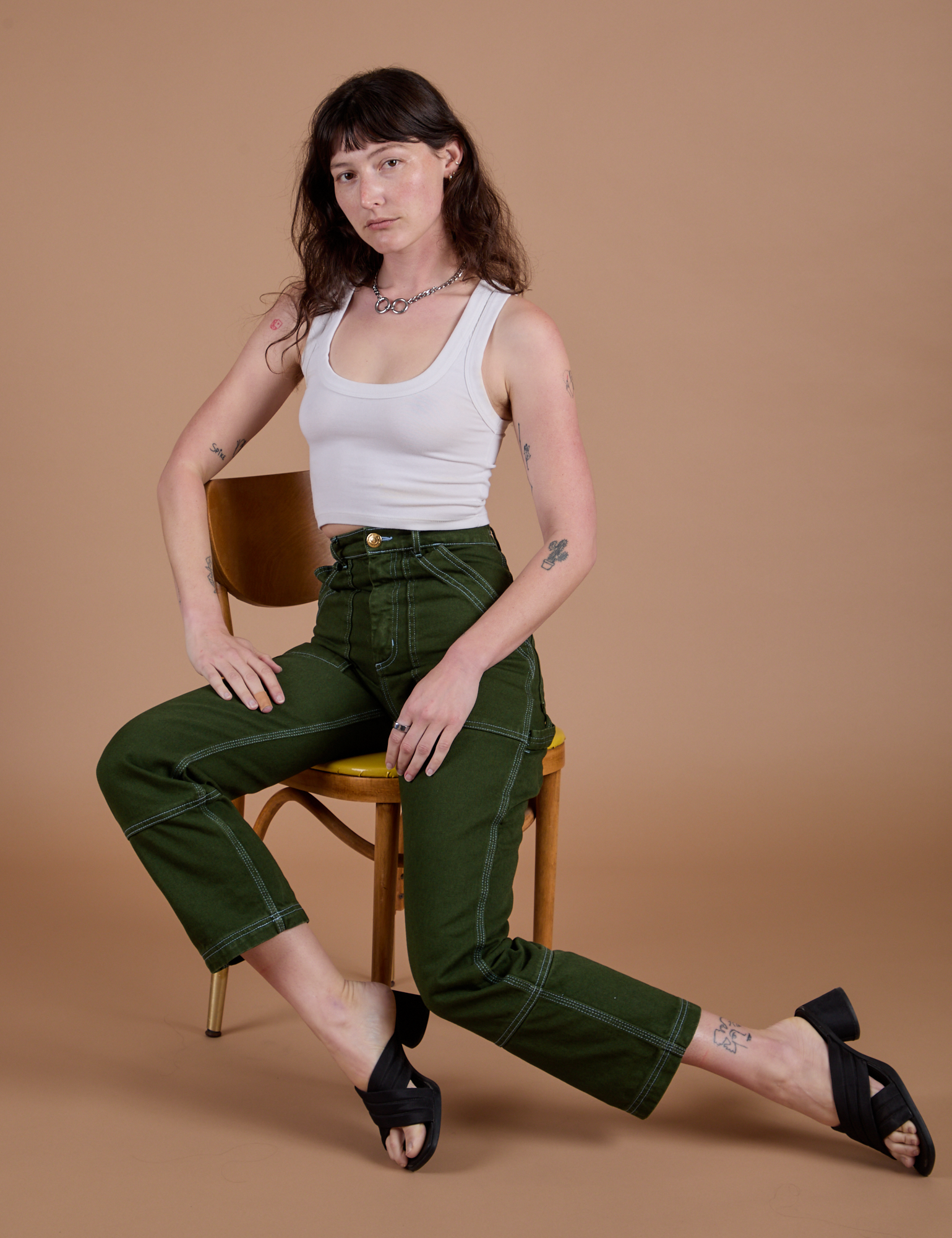 Carpenter Jeans in Evergreen and Cropped Tank in Vintage Tee White on Alex