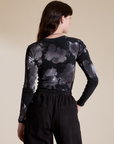 Long Sleeve Baby Tee in Ink Blot back view on Alex
