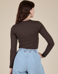 Long Sleeve Baby Tee in Espresso Brown back view on Alex