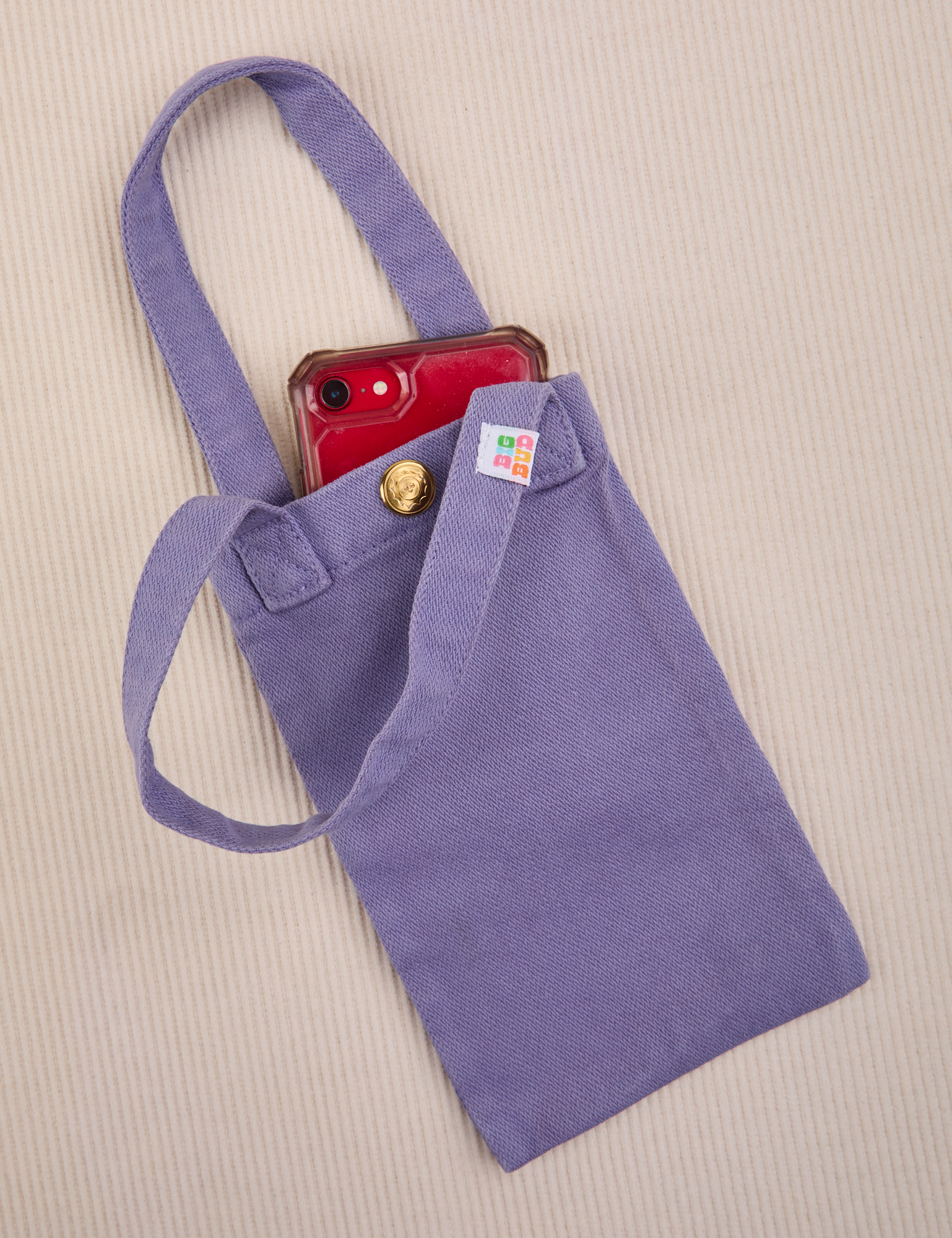 Phone tucked into faded grape Cell Phone Tote