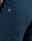 Action Pants in Lagoon back pocket close up on Demi