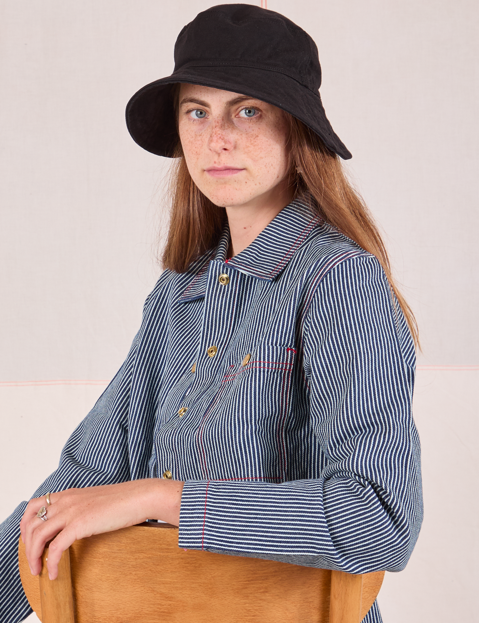 Scarlett is wearing Wide Brim Denim Bucket Hat