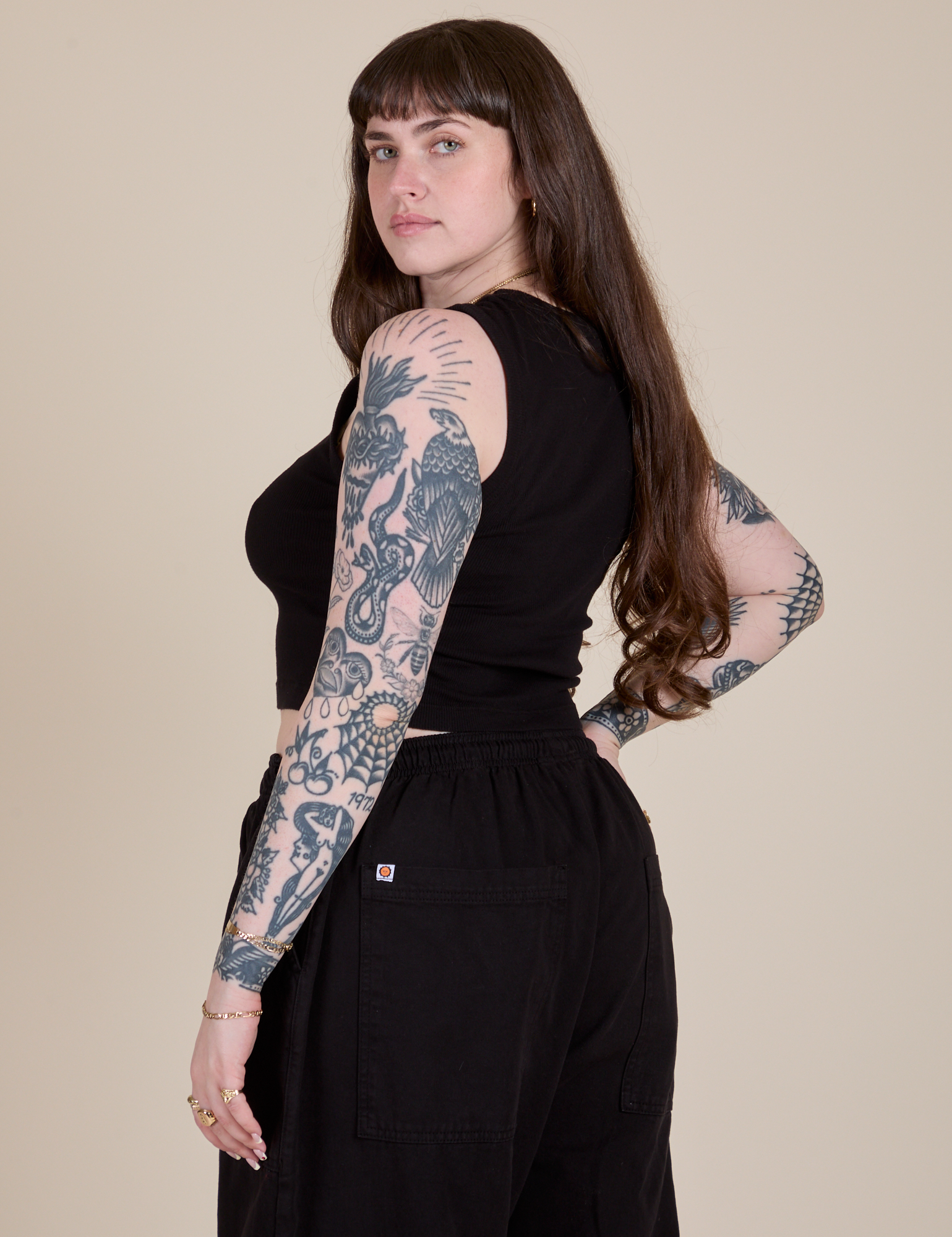 Angled back view of Muscle Tee in Basic Black on Sydney