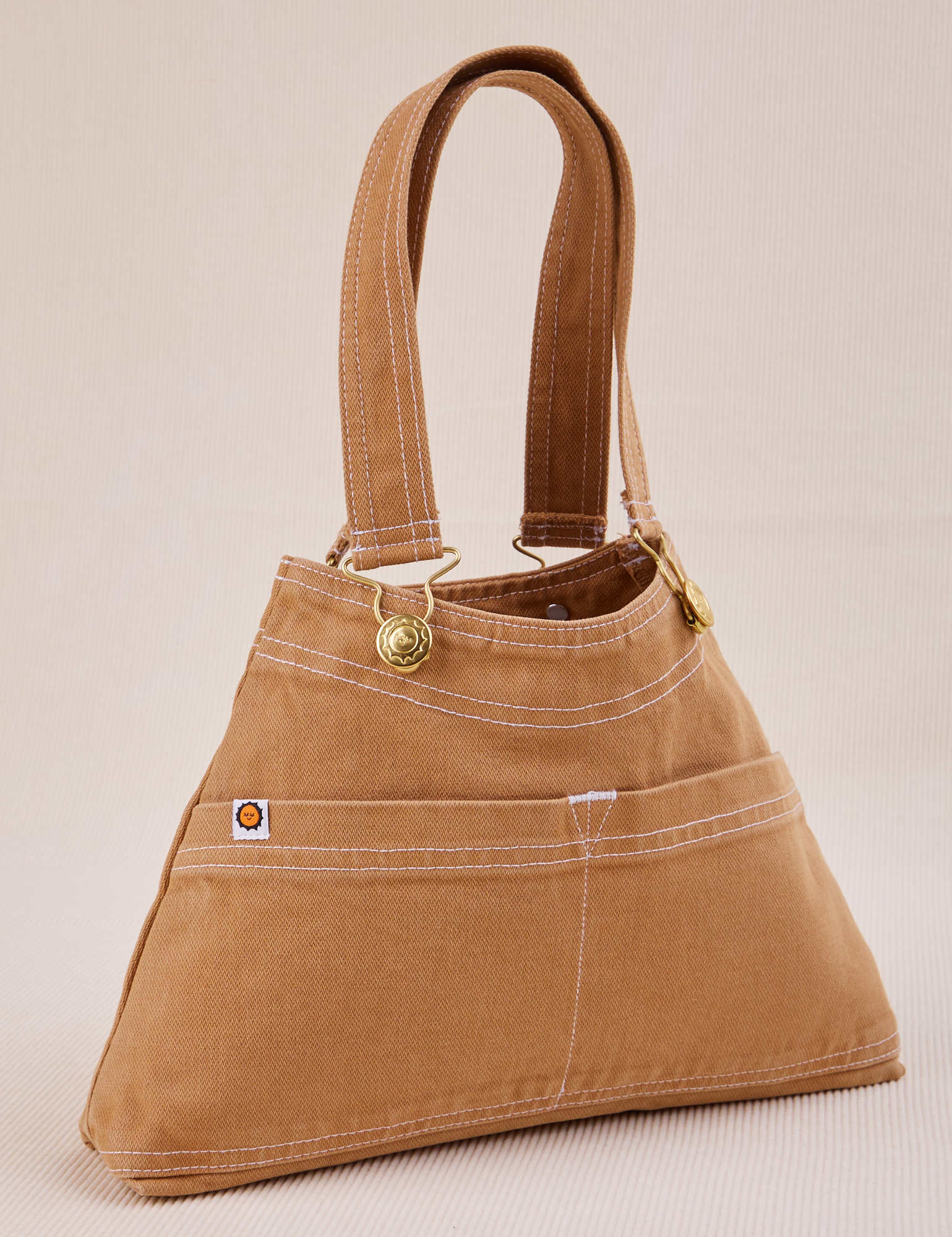 Overall Handbag in Tan angled view