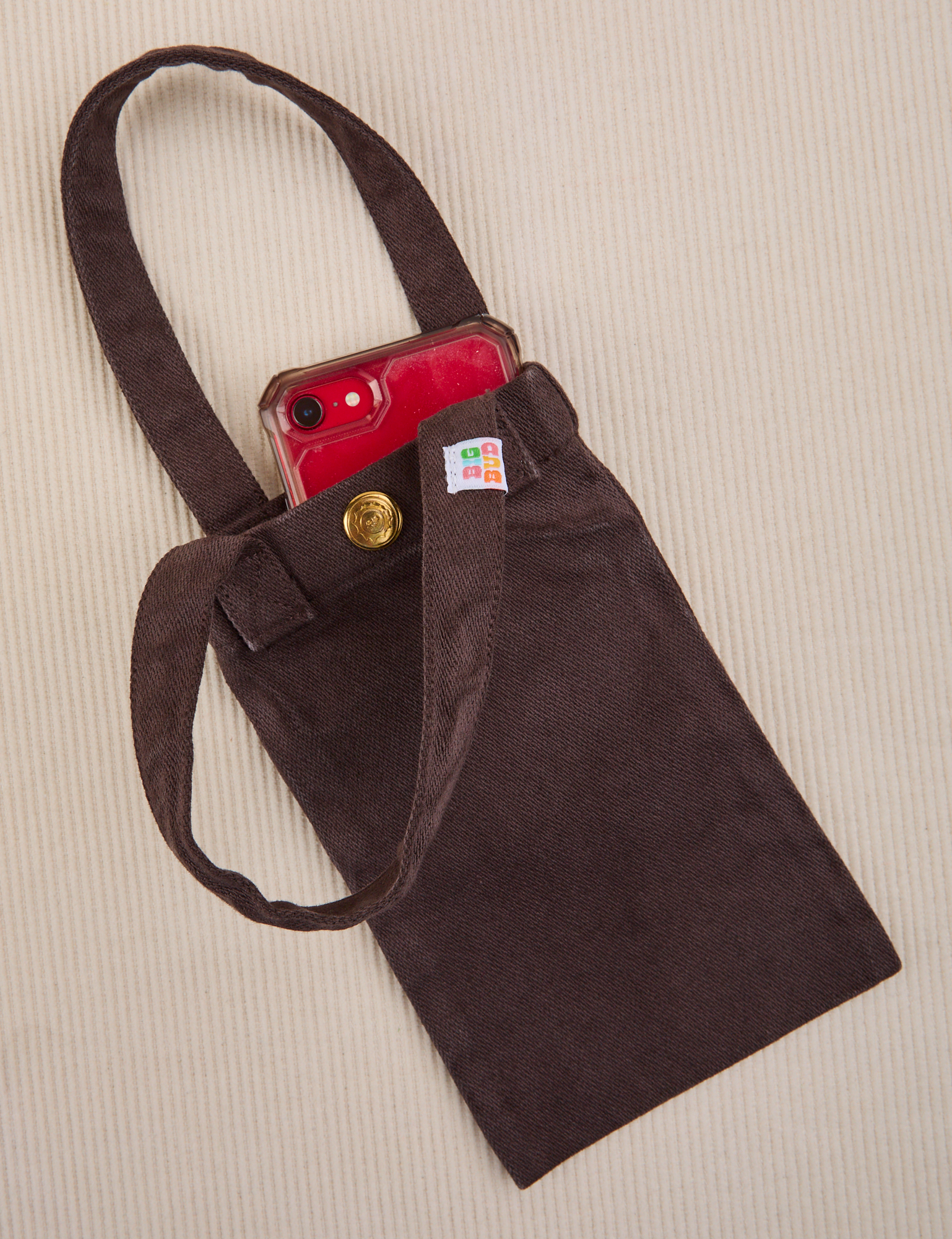 Phone tucked into espresso brown Cell Phone Tote