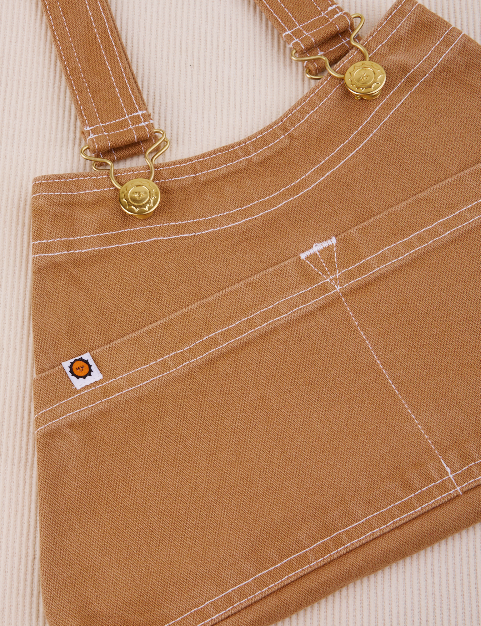 Overall Handbag in Tan laid flat