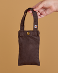 Cell Phone Tote in Espresso Brown held by model