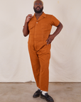 Elijah is 6’4” and wearing 4XL Short Sleeve Jumpsuit in Burnt Terracotta 