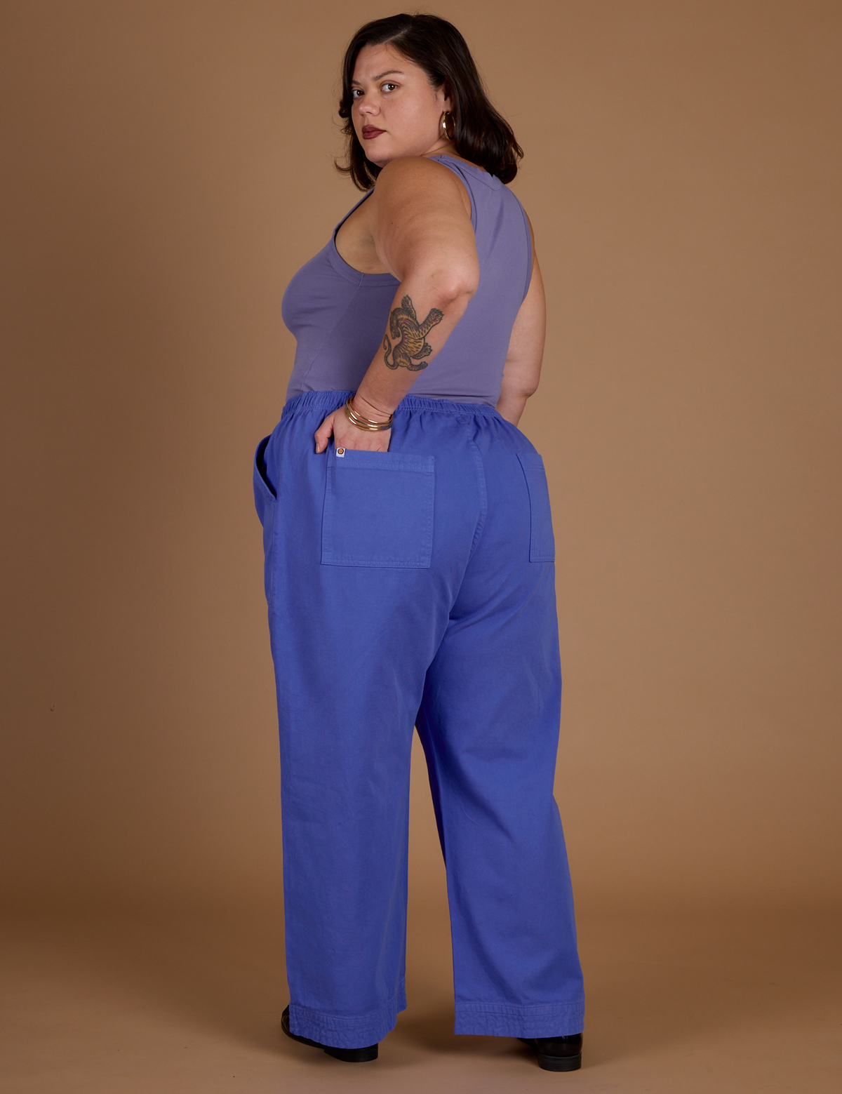 Angled back view of the Cornflower Blue Action Pant