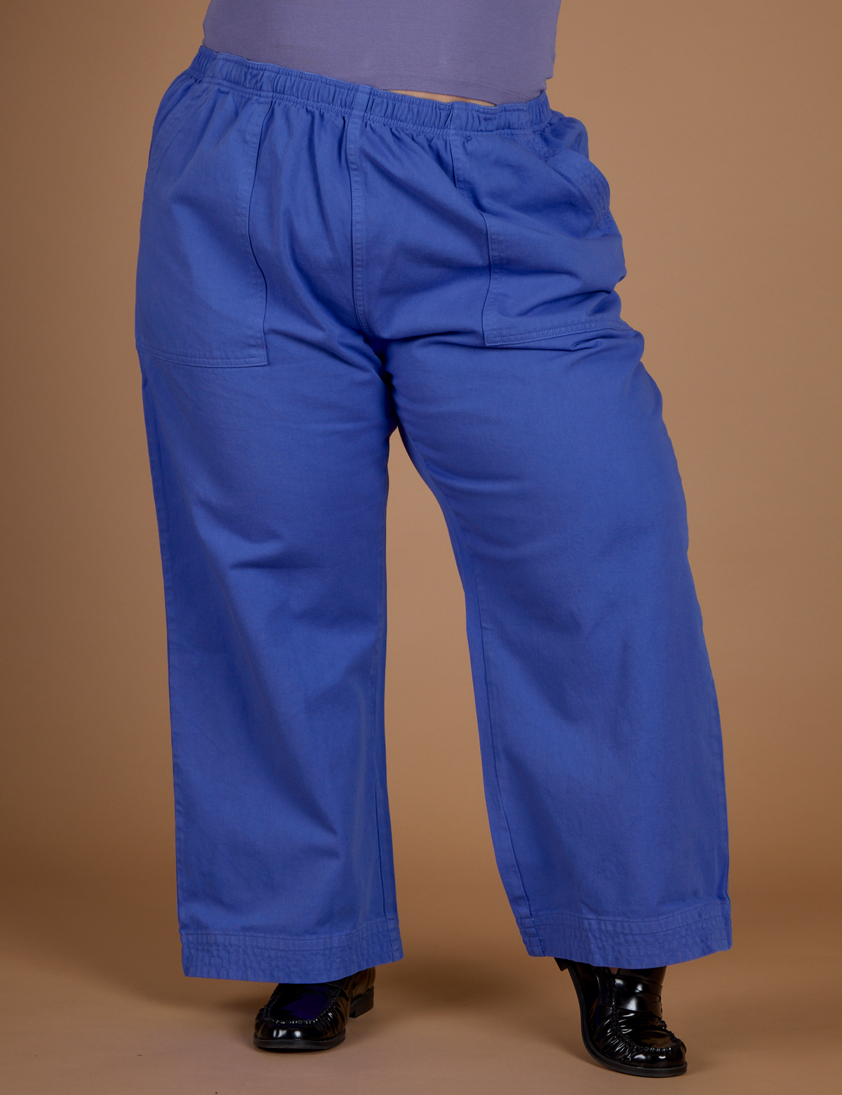 Close up of the Cornflower Blue Action Pant on Kristen