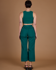 Back view of the Hunter Green Action Pant on Alex