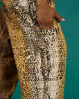 Close up of Kandia's hand in the side leg pocket of the Leopard Drop Pocket Pant
