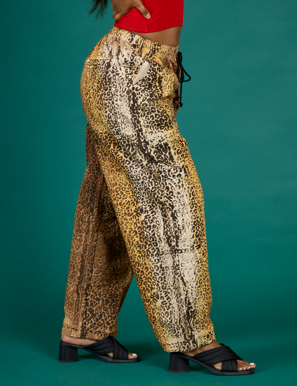 Close up side view of the Leopard Drop Pocket Pant on Kandia