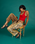 Kira wearing the Leopard Drop Pocket Pant with the Mustang Red Cropped Tank