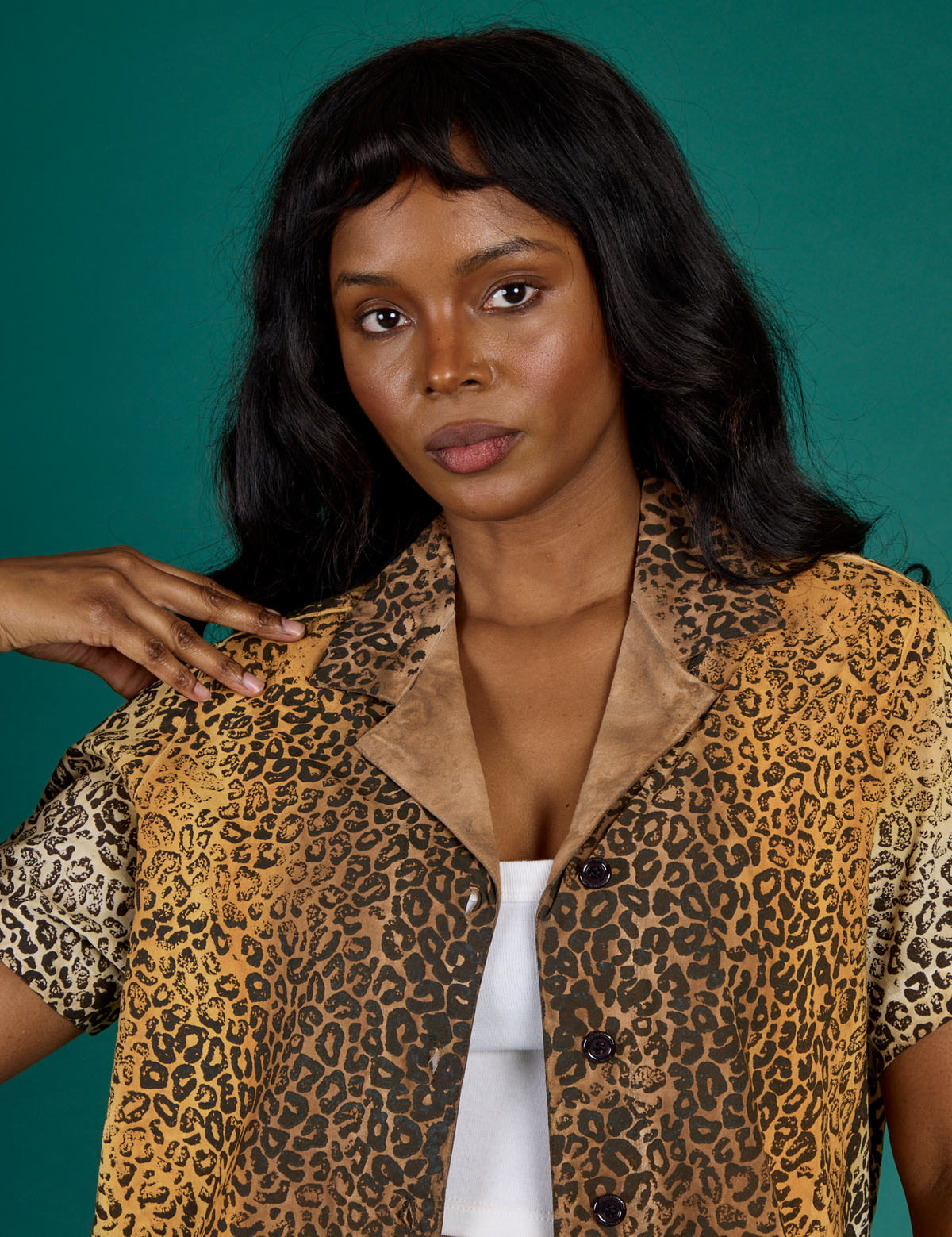 Close up of Kandia wearing the Leopard Pantry Button Up