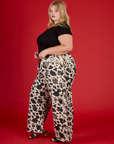 Side view of the Cow Drop Pocket Pant with the Black Cropped Baby Tee on Juliet