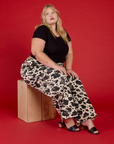 Juliet wearing the Cow Drop Pocket Pant with the Black Cropped Baby Tee
