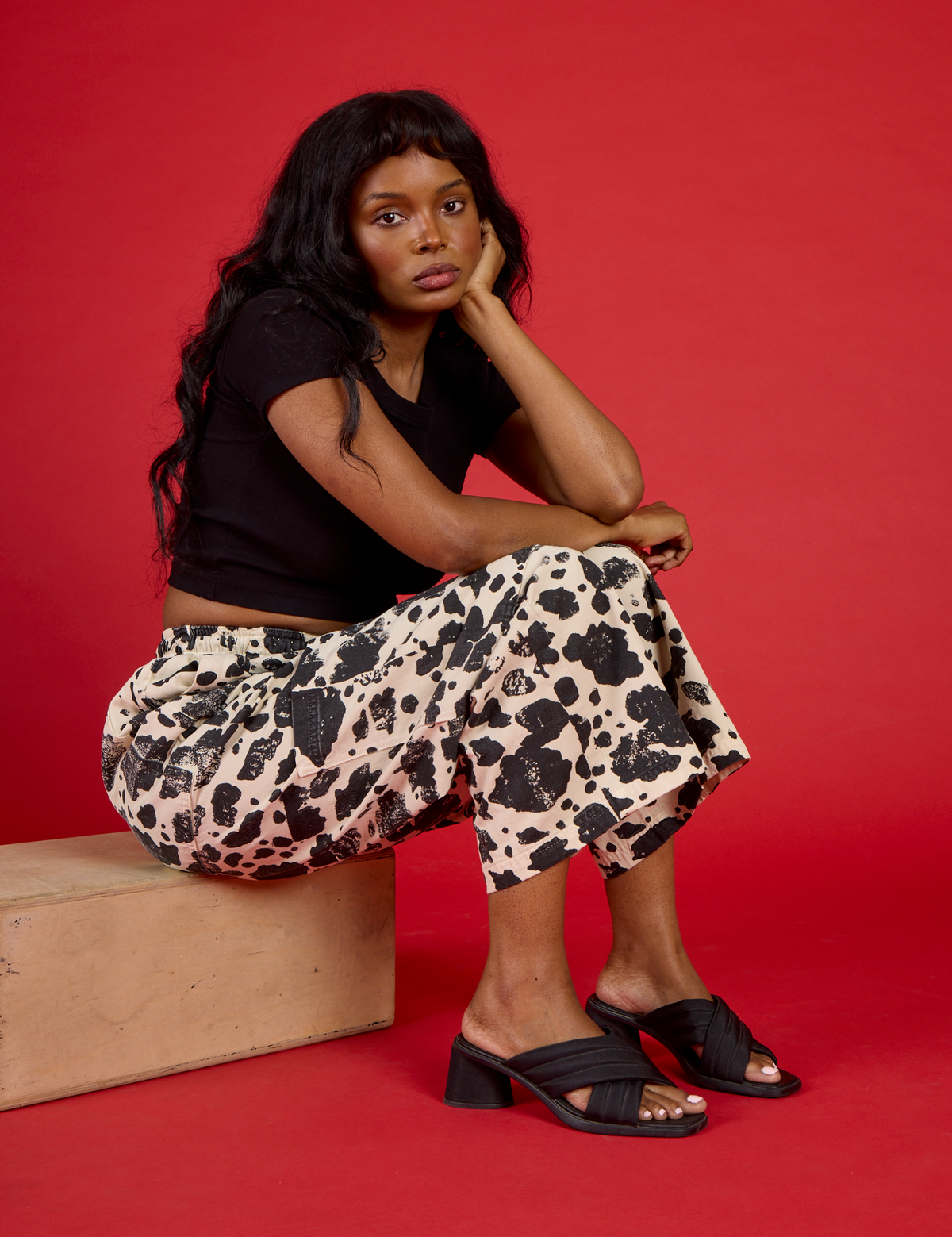 Kandia wearing the Cow Drop Pocket Pant with the Black Cropped Baby Tee
