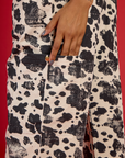 Close up on the side leg pocket of the Cow Drop Pocket Pant worn by Kira