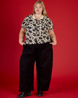 Juliet wearing the Cow Pantry Button Up with Black Drop Pocket Pants