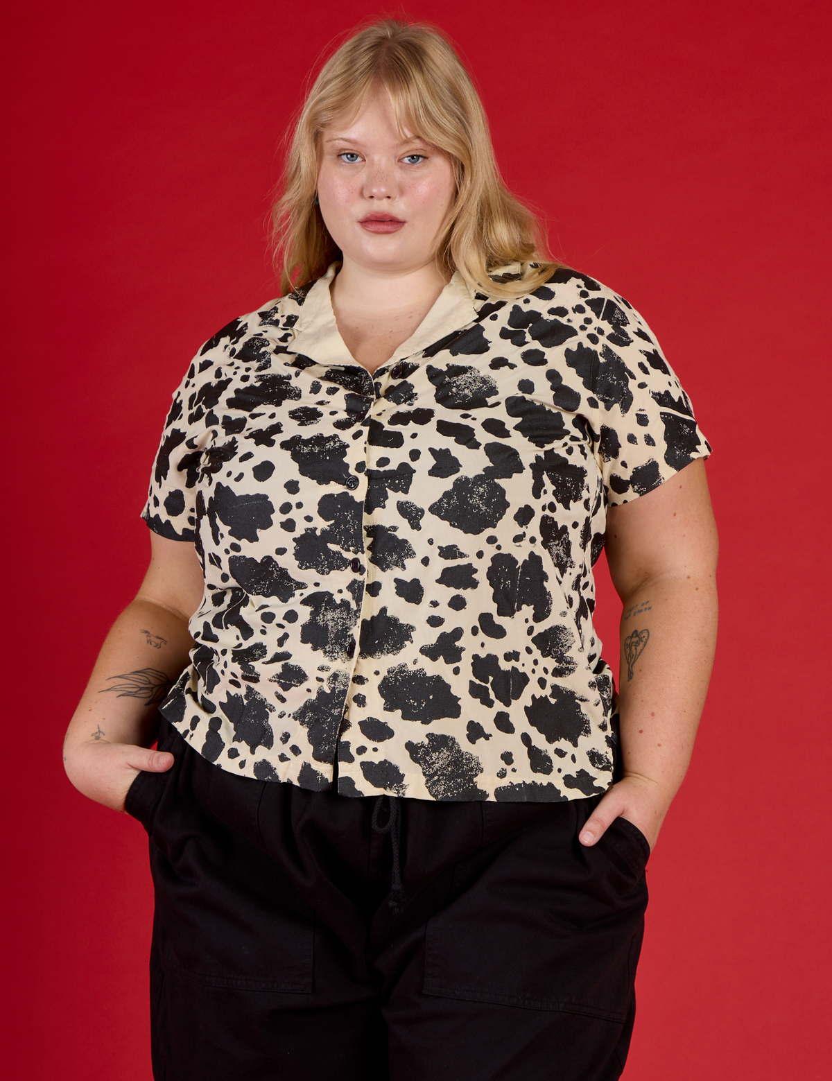 Close up of Juliet wearing the Cow Pantry Button Up