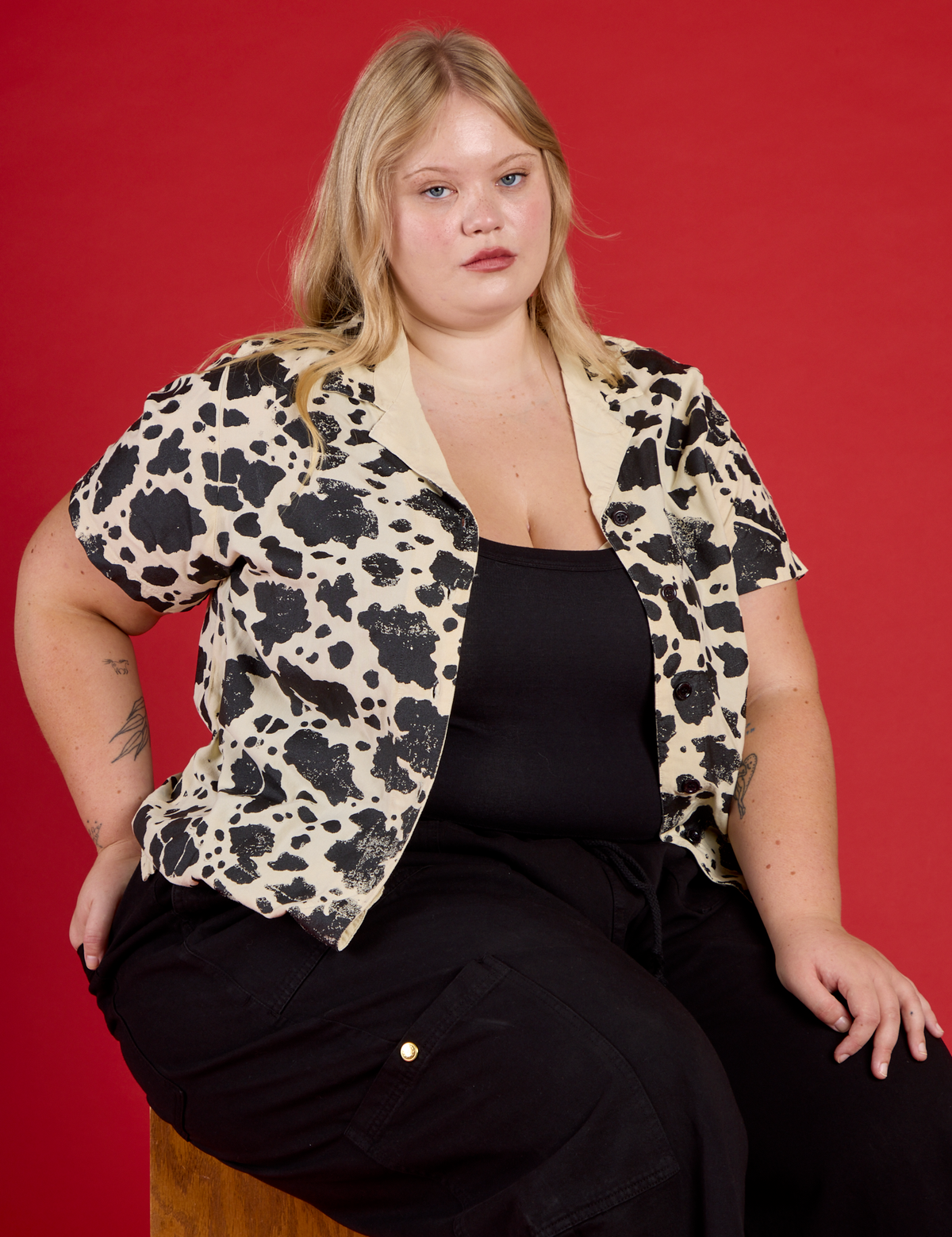 Juliet wearing the Cow Pantry Button Up