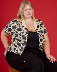 Juliet wearing the Cow Pantry Button Up