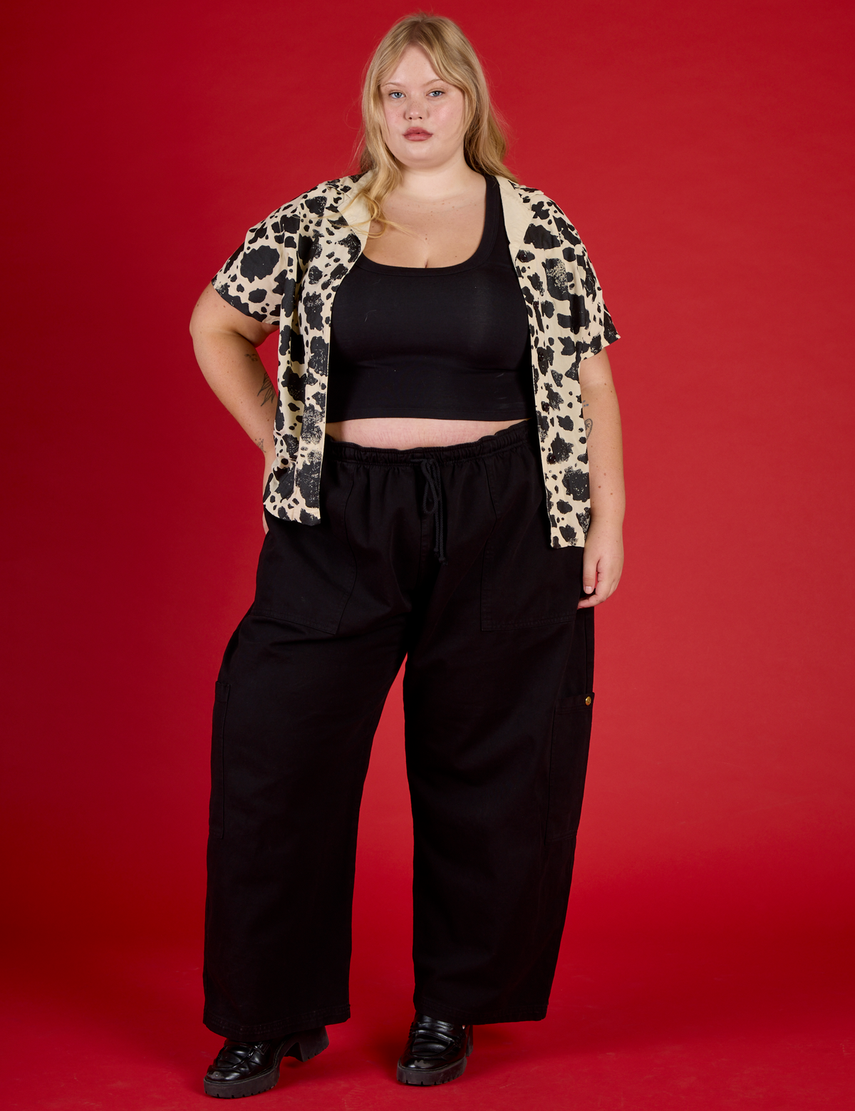 Juliet is 5'7" wearing L Cow Pantry Button Up with the Black Cropped Tank and Black Drop Pocket Pants