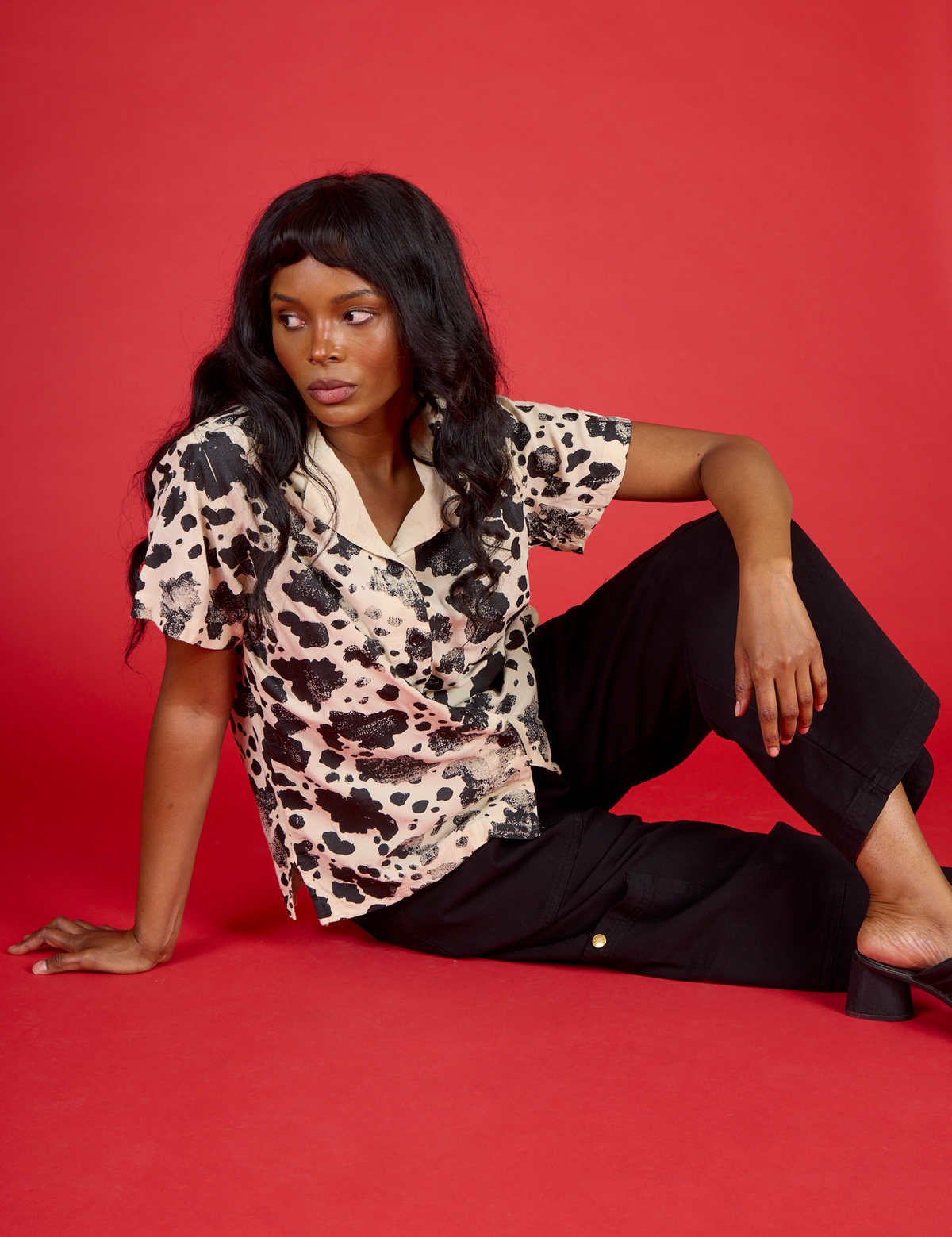 Kandia wearing the Cow Pantry Button Up with the Black Drop Pocket Pants