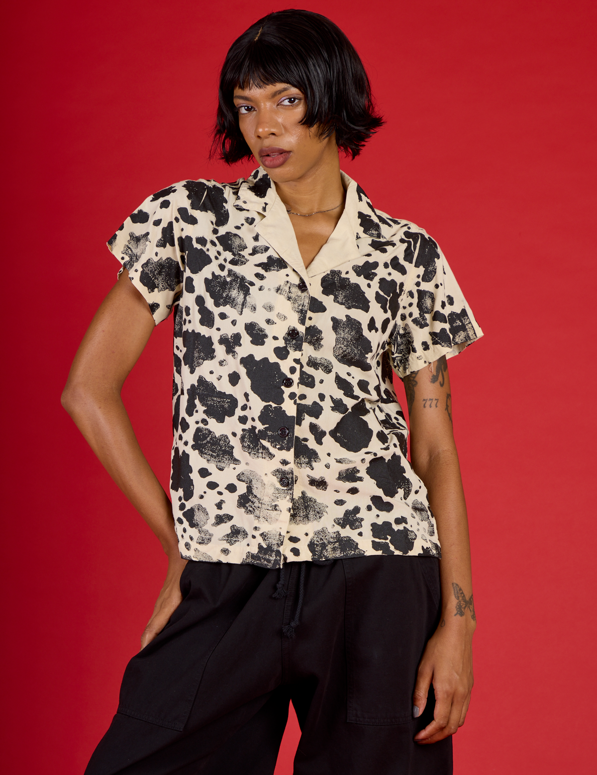 Kira wearing the Cow Pantry Buttoned Up