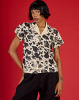 Kira wearing the Cow Pantry Buttoned Up