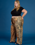 Angled side view of Juliet in the Tiger Drop Pocket Pant
