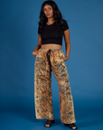 Kandia is 5'3" and wearing XS Tiger Drop Pocket Pant with the Black Cropped Baby Tee