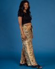 Angled side view of Kandia wearing the Tiger Drop Pocket Pant
