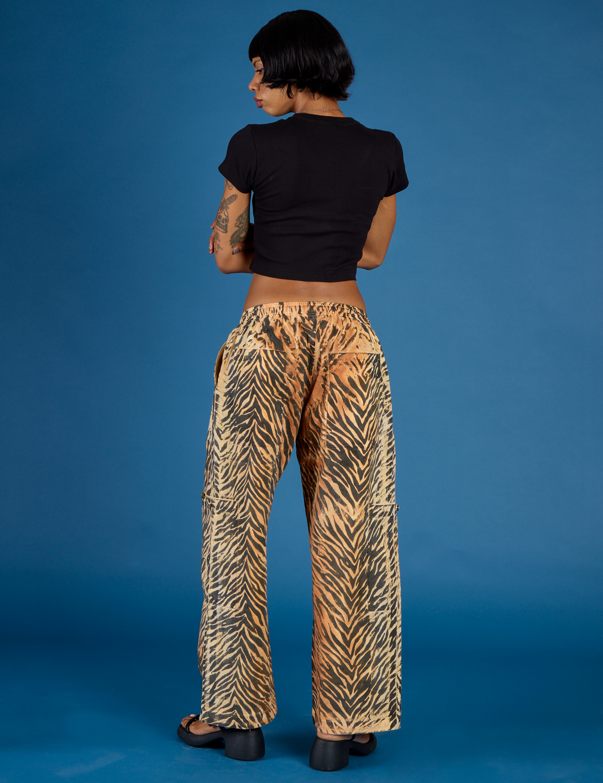 Back view of the Tiger Drop Pocket Pant on Kira