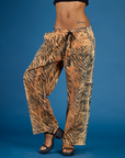 Close up of the Tiger Drop Pocket Pant on Kira