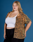 Angled side view of Juliet wearing the Tiger Pantry Button Up