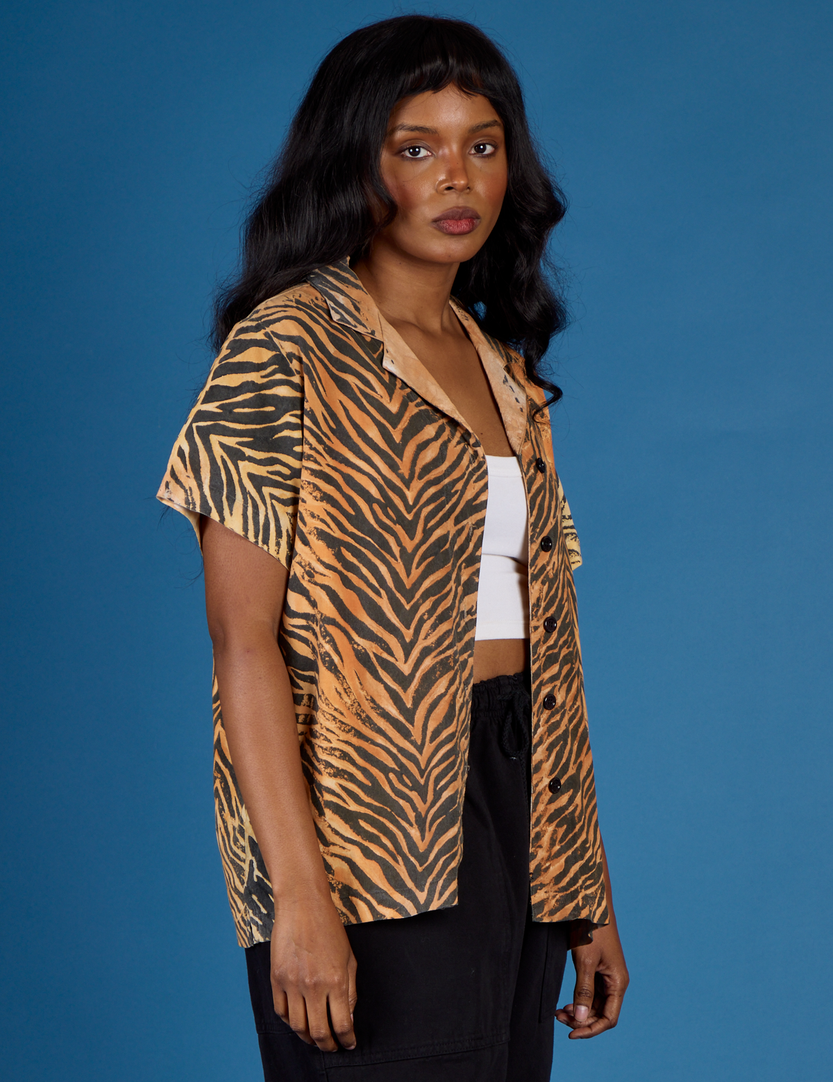 Angled side view of the Tiger Pantry Button Up