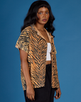 Angled side view of the Tiger Pantry Button Up