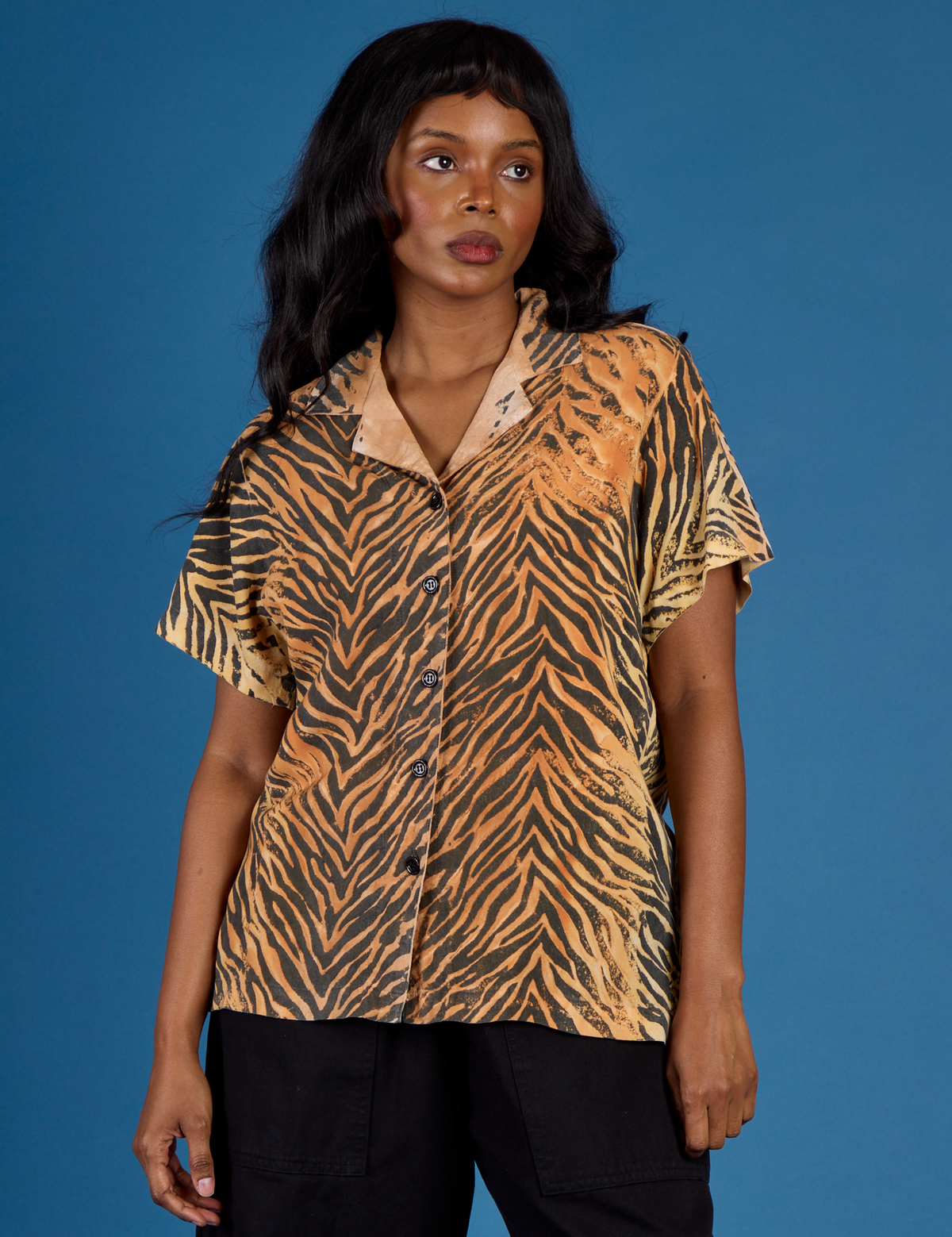 Kandia wearing the Tiger Pantry Button Up