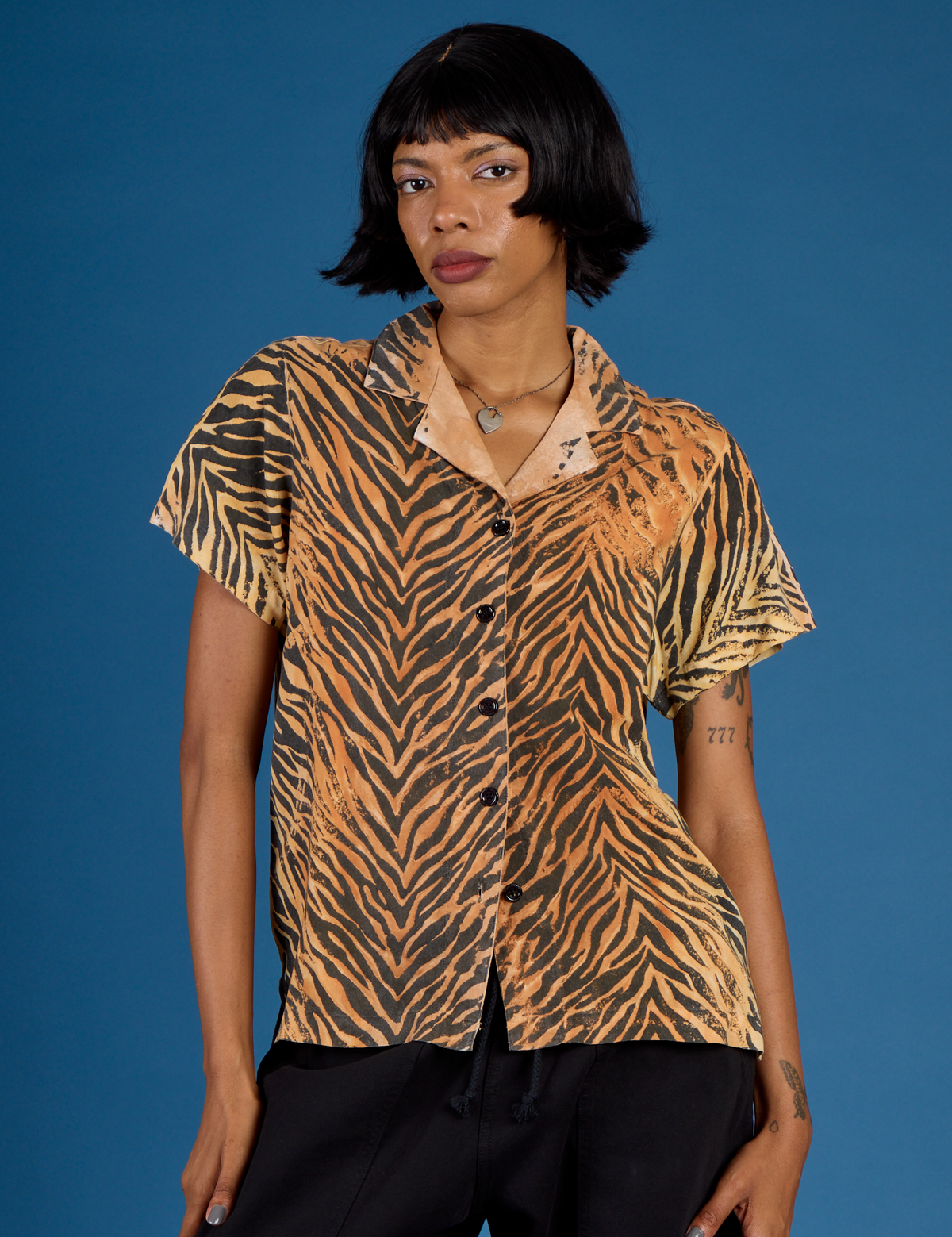 Kira wearing the Tiger Pantry Buttoned Up