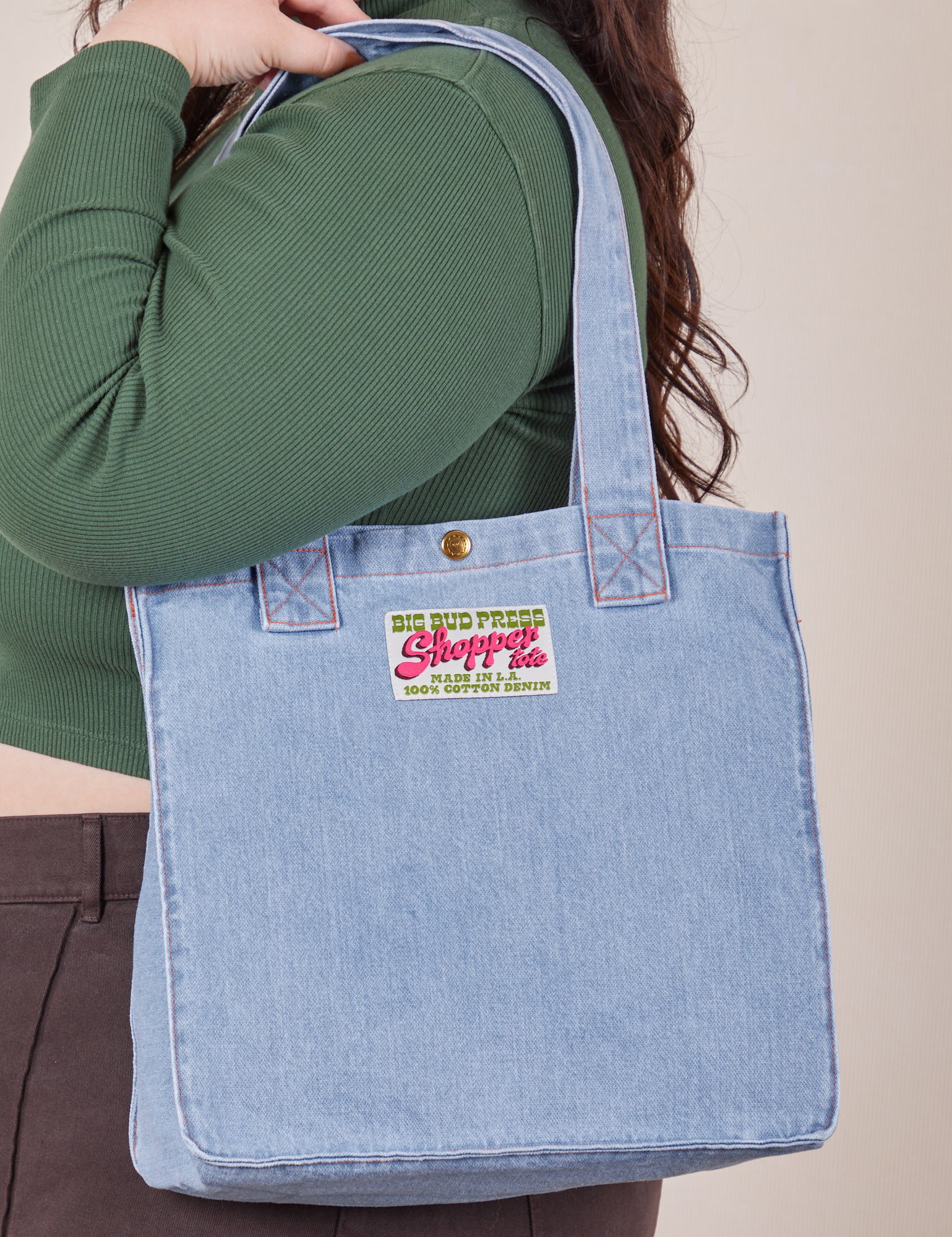 Denim Shopper Tote Bag in Light Wash worn on model's shoulder