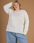 Juliet is 5'7" and wearing L Vintage Tee White Long Sleeve Burly Tee