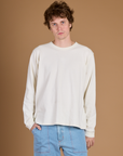 Quinn is 6'3" and wearing M Vintage Tee White Long Sleeve Burly Tee