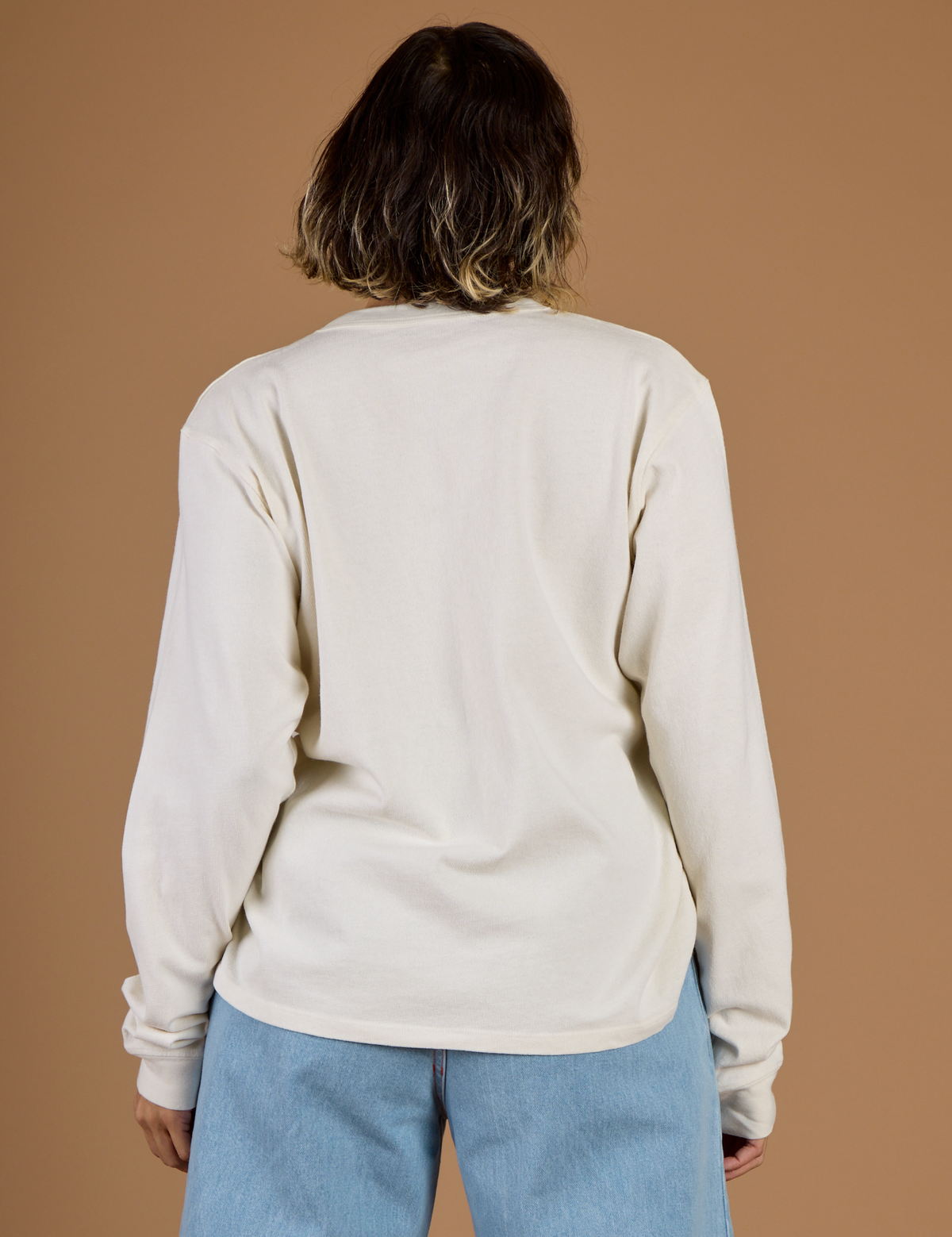 Back view of the Vintage Tee White Long Sleeve Burly Tee on Tiara